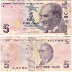 (222c) Turquía. 2009. 5 Lira (MBC) Manchas